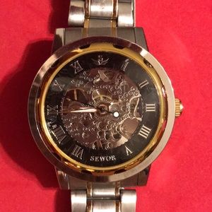Men’s skeleton dial stainless steel band watch